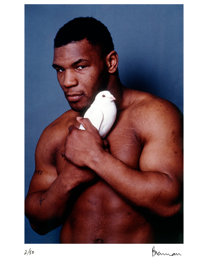 Mike Tyson with his tumbler pigeon, 1985 by Michael Brennan – Limited Edition Print.