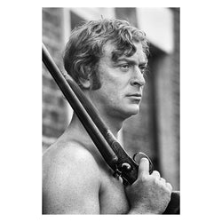 Michael Caine holding a rifle, 1970 – Limited Edition Print by Terry O'Neill – Limited Edition Print.