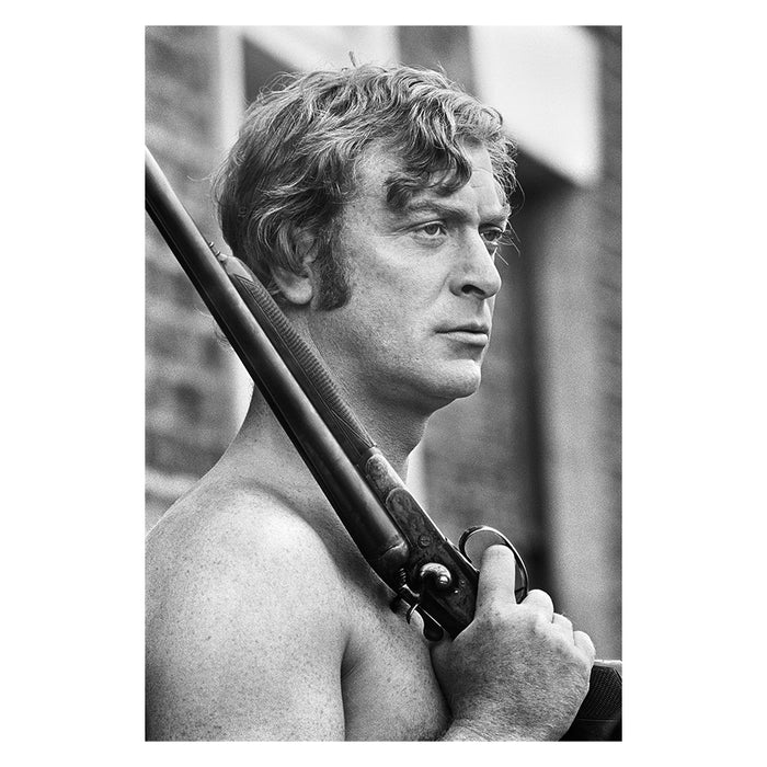 Michael Caine holding a rifle, 1970 — Limited Edition Print - Terry O'Neill