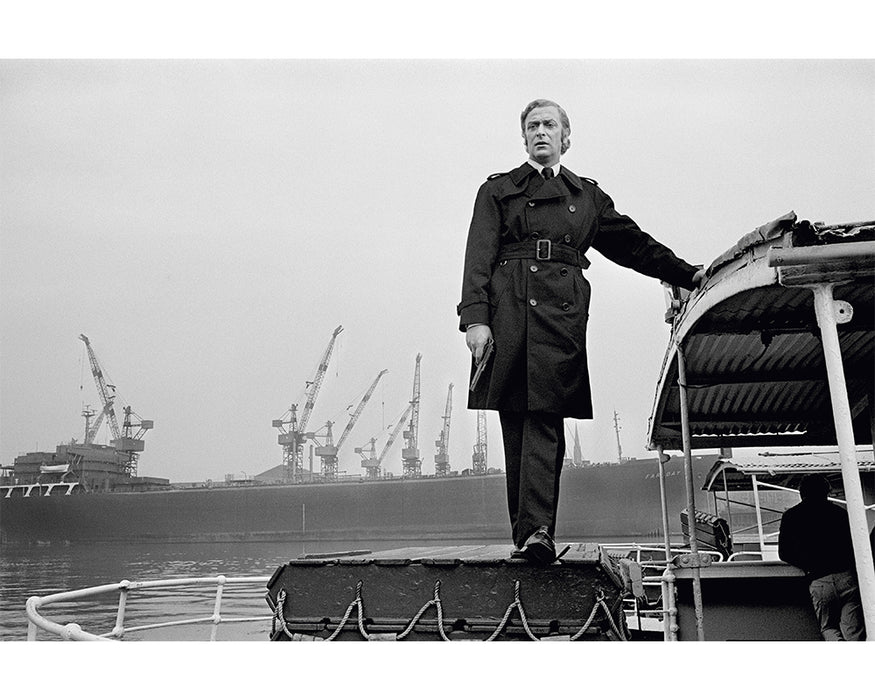 Michael Caine stands on a boat, 1970 — Limited Edition Print