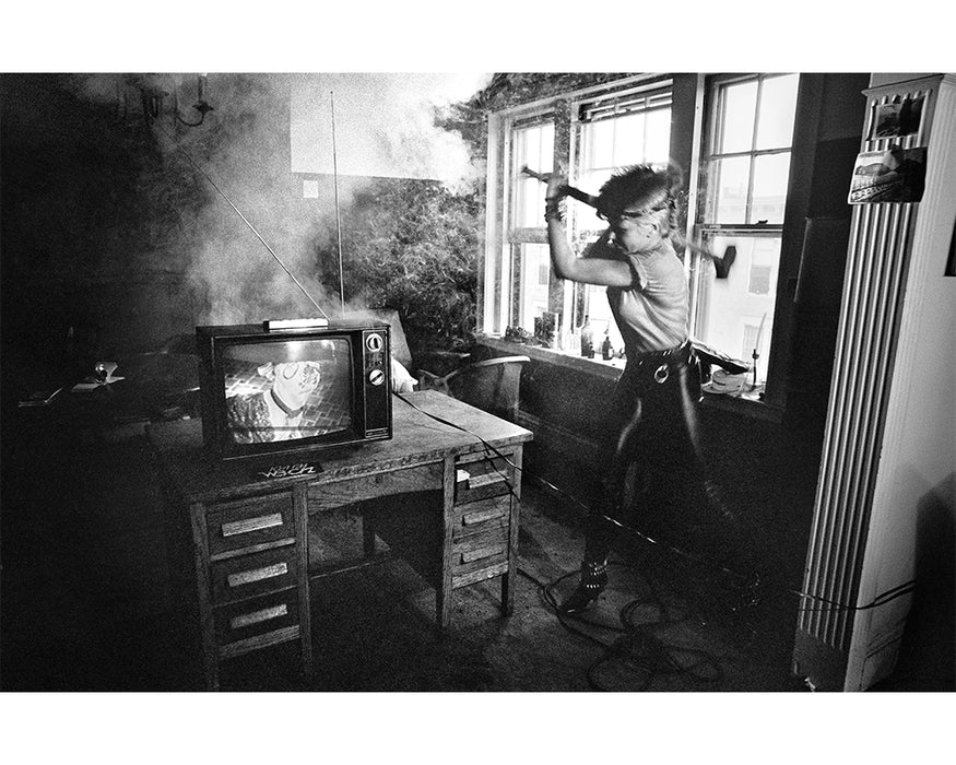 Wendy O. Williams smashes a TV, 1980 — Limited Edition Print - Michael Grecco