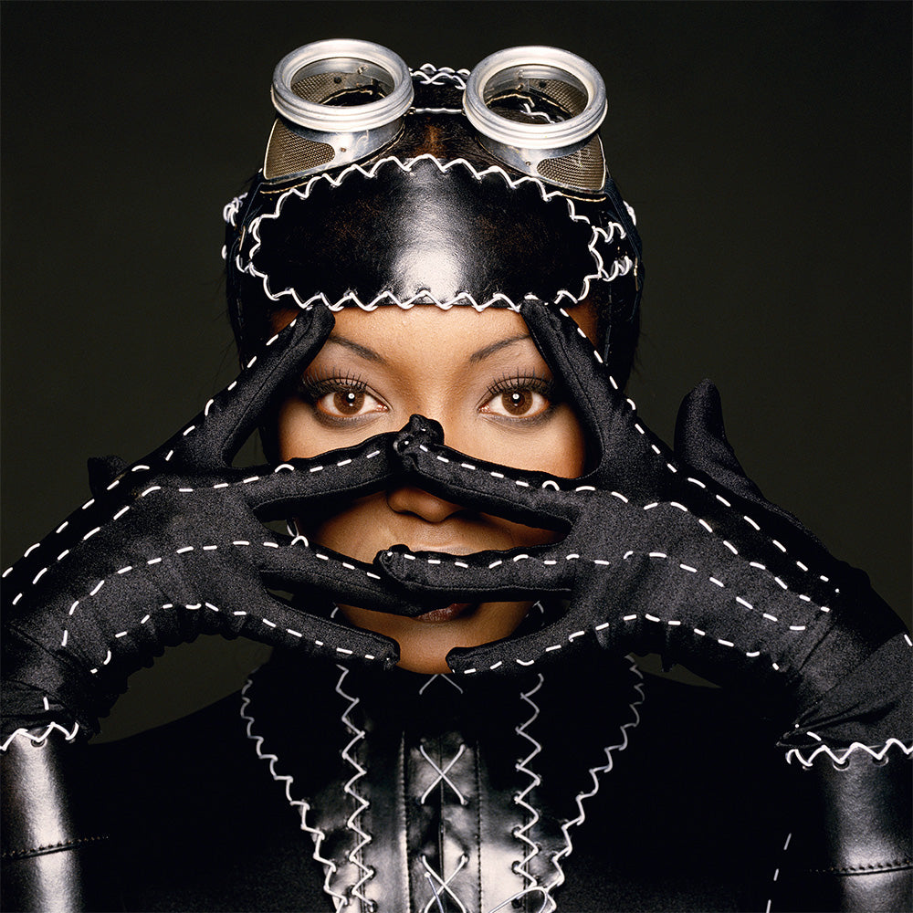 Naomi Campbell peeking through her fingers, 1992 by Terry O'Neill – Limited Edition Print.
