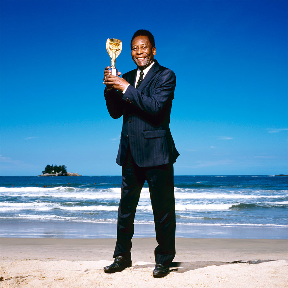 Pelé holding the World Cup Trophy, 2013 — Limited Edition Print - Terry O’Neill
