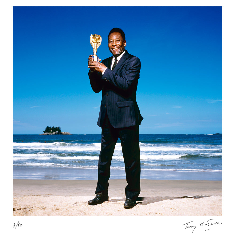Pelé holding the World Cup Trophy, 2013 by Terry O'Neill – Limited Edition Print.