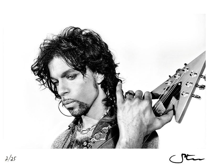 Prince posing with his Auerswald symbol guitar — Limited Edition Print - Steve Parke