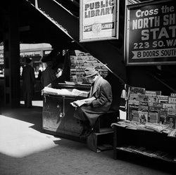 Man reading Billboard Magazine, 1950s - Limited Edition Print by Ted Williams – Limited Edition Print.