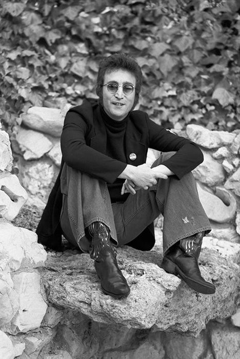 John Lennon sitting on a rock, 1973 — Limited Edition Print - Tom Zimberoff